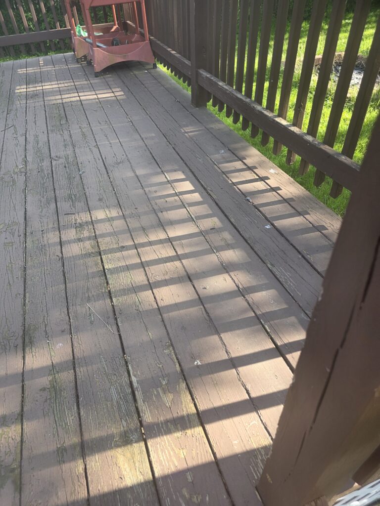 Wooden deck surface before restoration and cleaning
