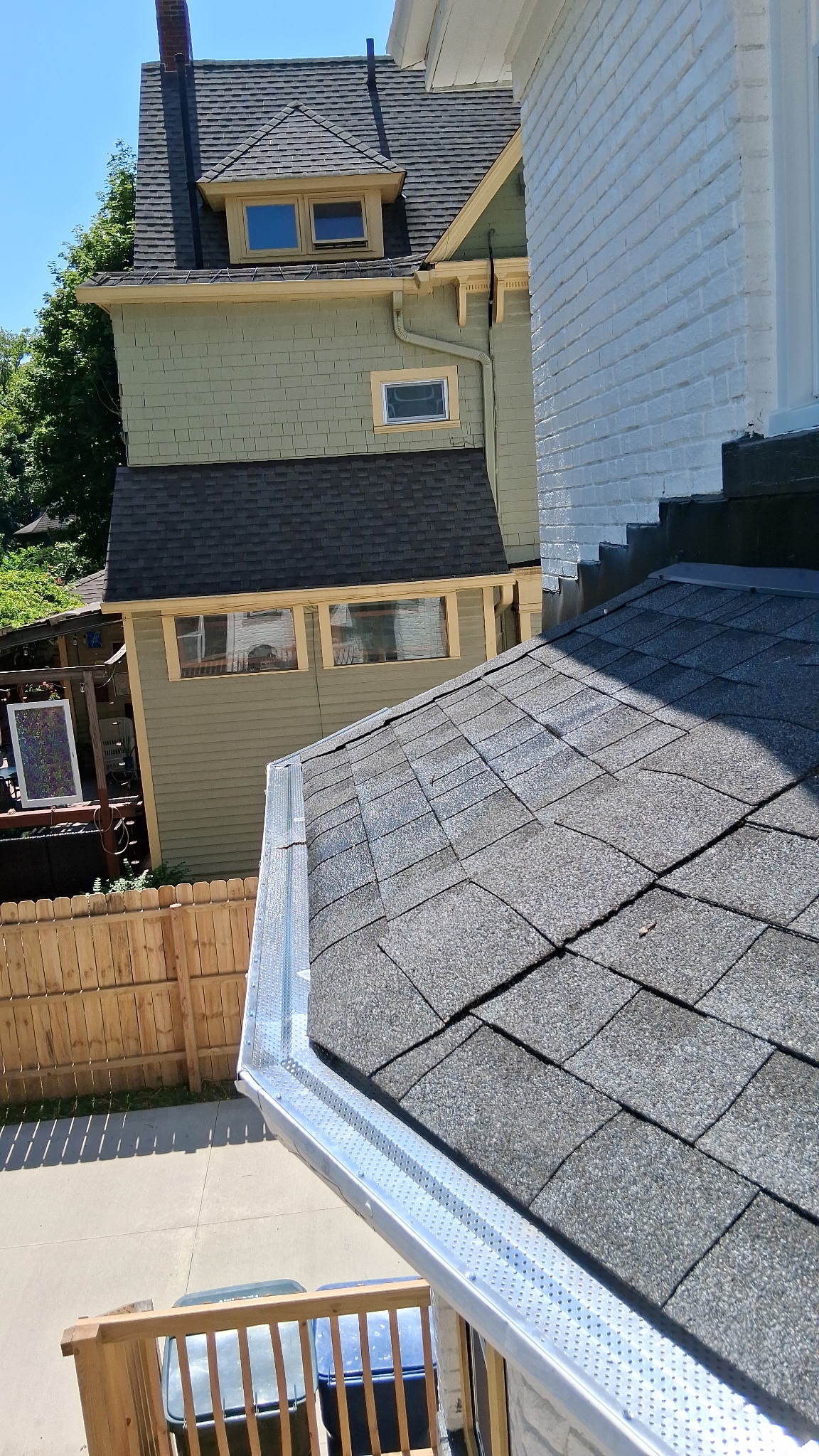 Close-up of newly installed gutter guard system on roof