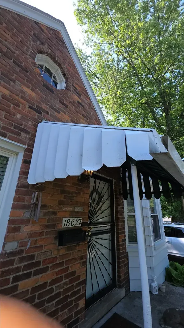 Brick & awning wash: after cleaning by ALWAYS B.I.G. Power Washing Pros